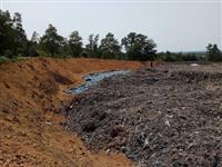 Doanh nghiệp vận tải đổ cả nghìn xe rác vào rừng đặc dụng Hà Nội